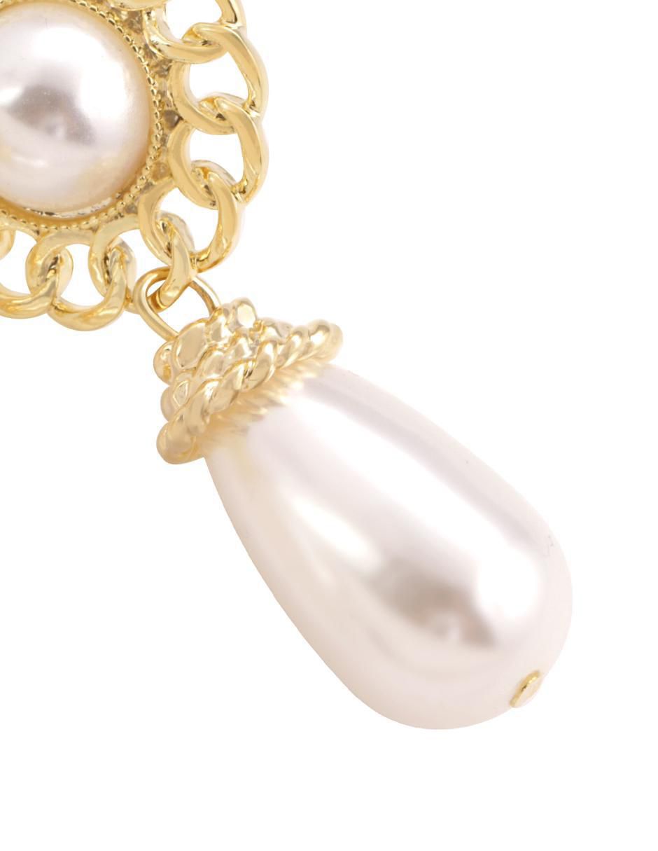 Aretes de flor con acabado baño de oro 18 K 2