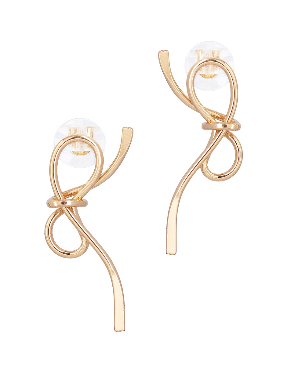Aretes de moño con acabado lustre