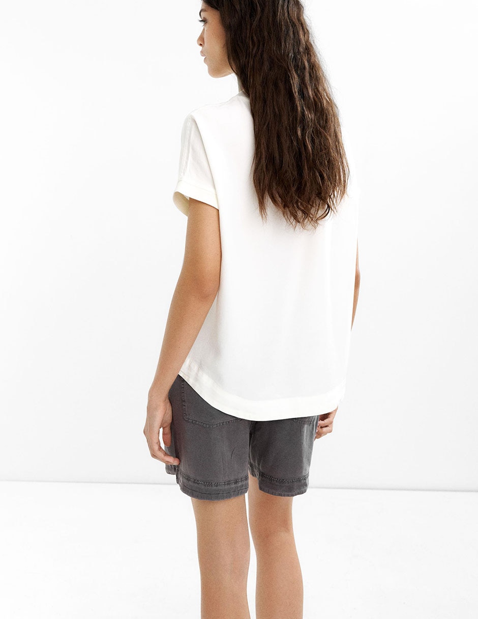 Top cuello redondo escote regular