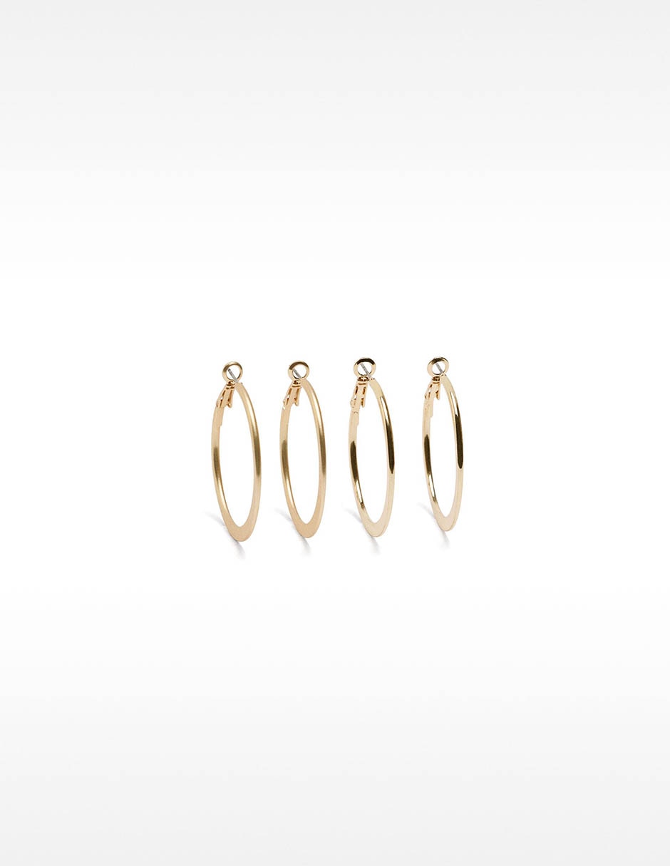 Set de aretes redondos con acabado lustre