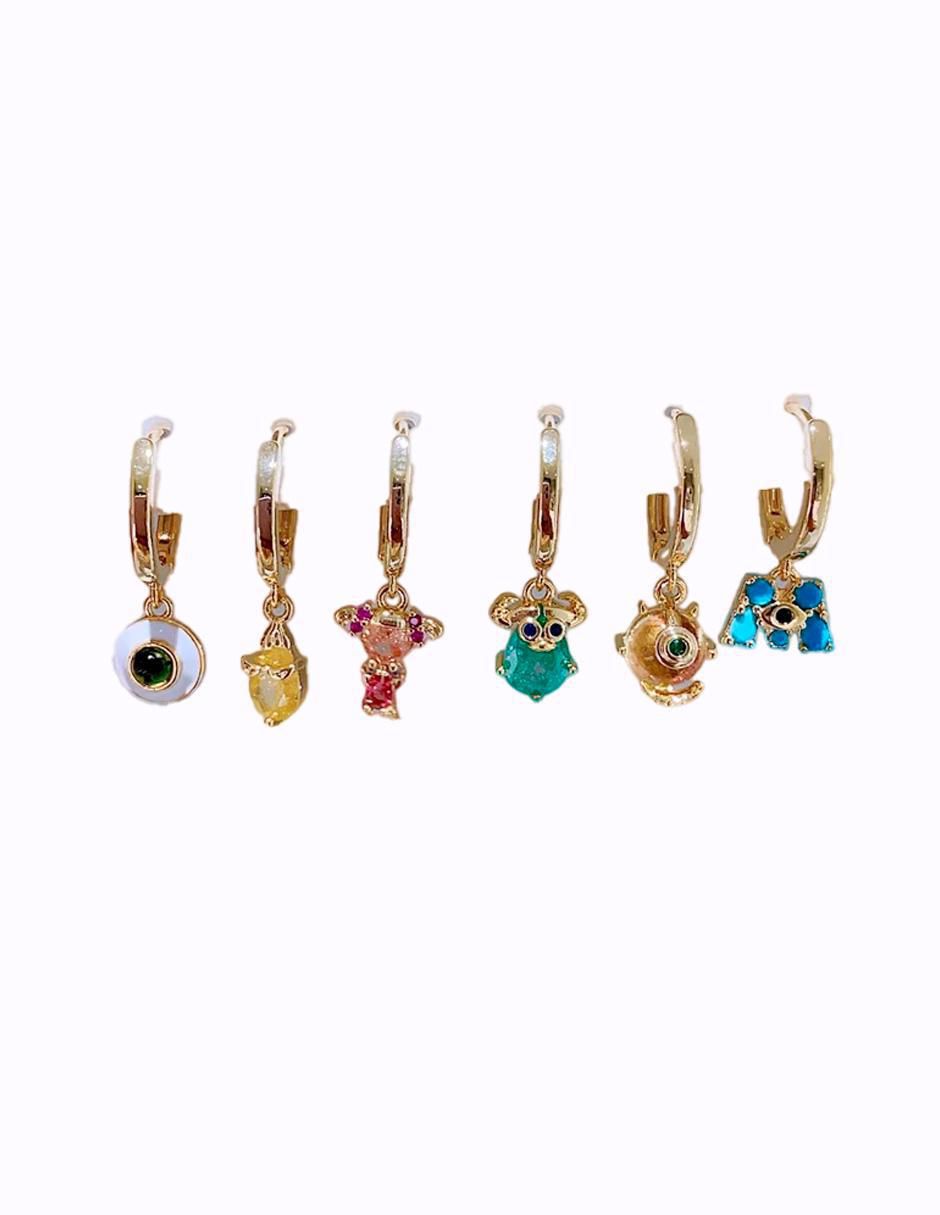 Set de aretes Monsters Inc con acabado pulido