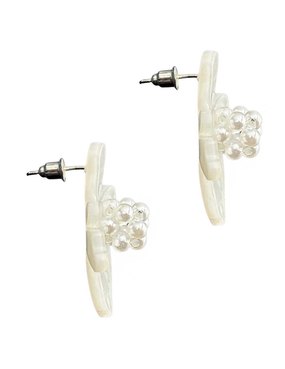 Aretes largos de flor Map con acabado liso