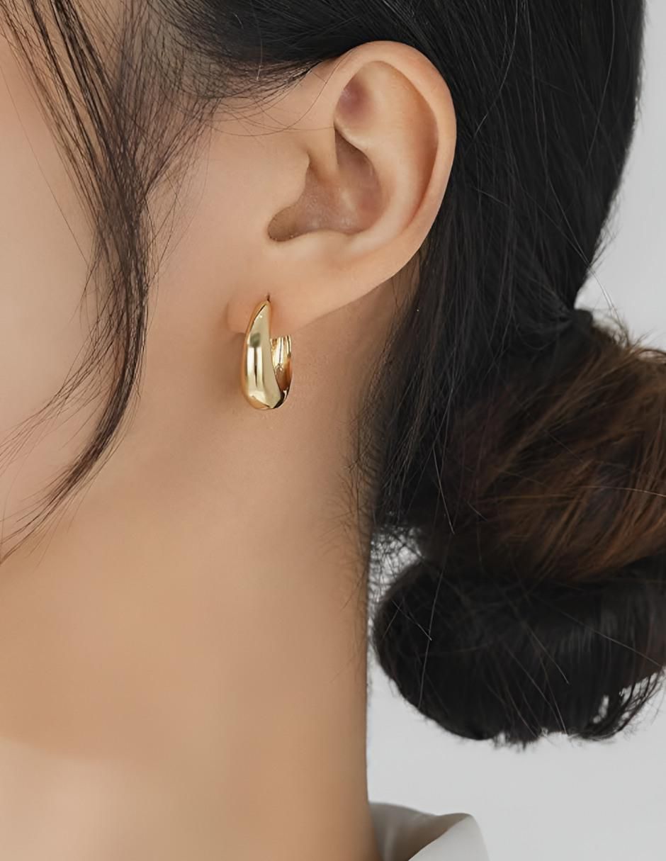 Aretes redondos con acabado chapa de oro 3