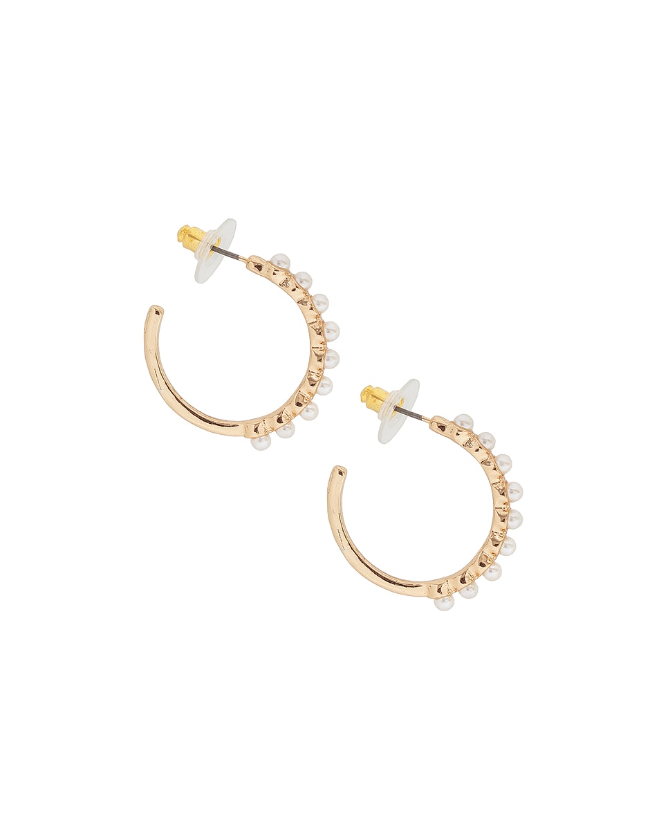 Aretes con acabado lustre perla
