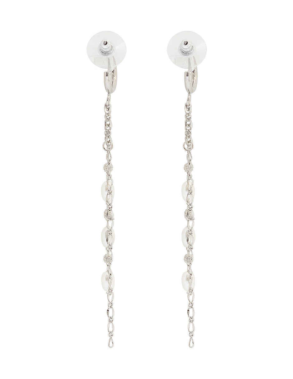 Aretes ovalados con acabado lustre perla 3
