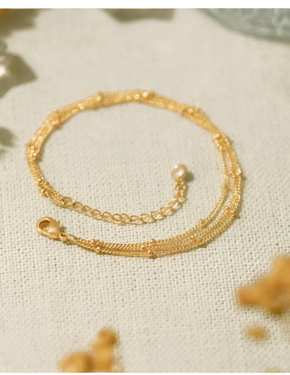 Pulsera acabado baño de oro 14 K