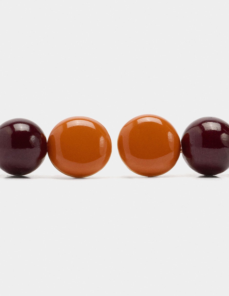 Aretes largos redondos Parfois Wine & Dine con acabado brillante