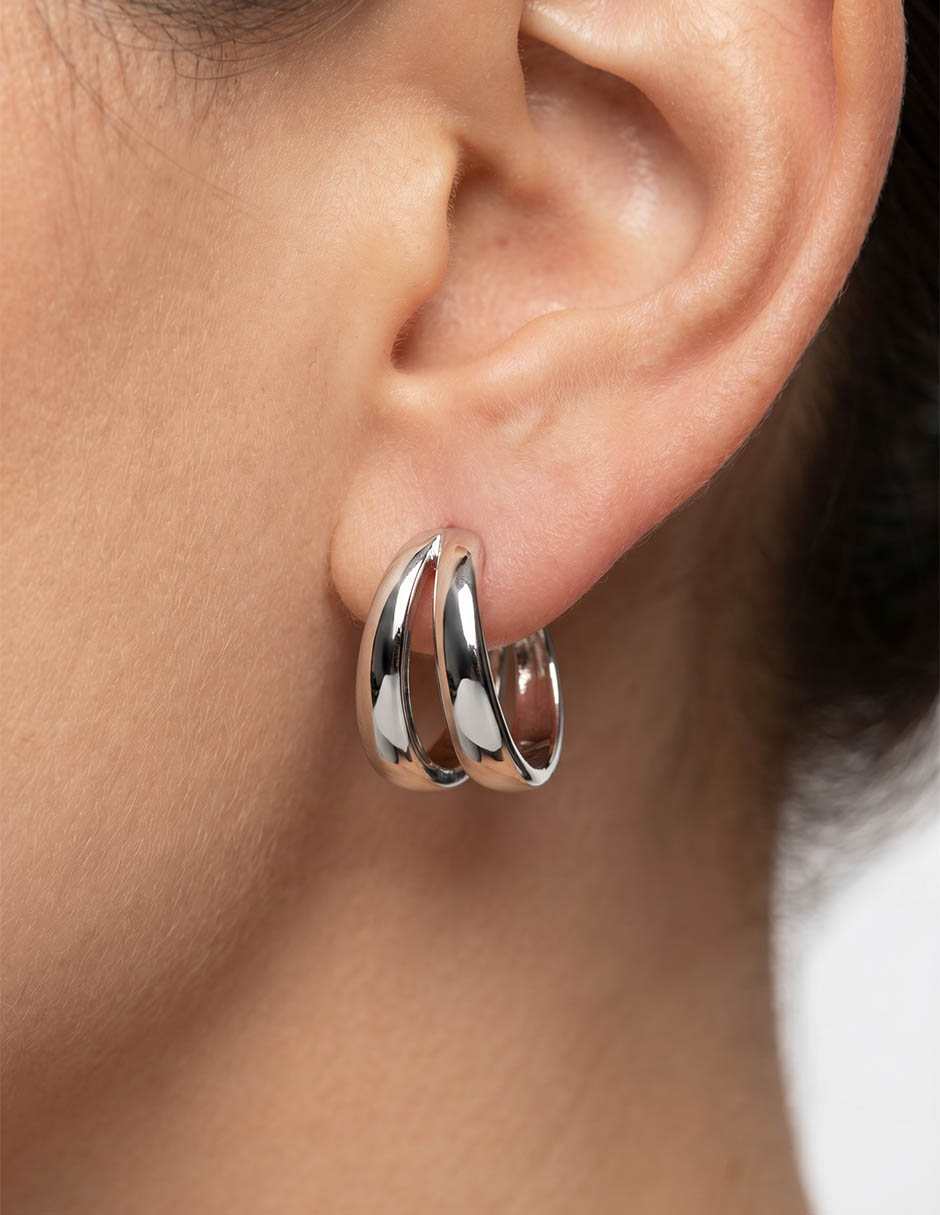 Aretes ear cuff circulares con acabado brillante