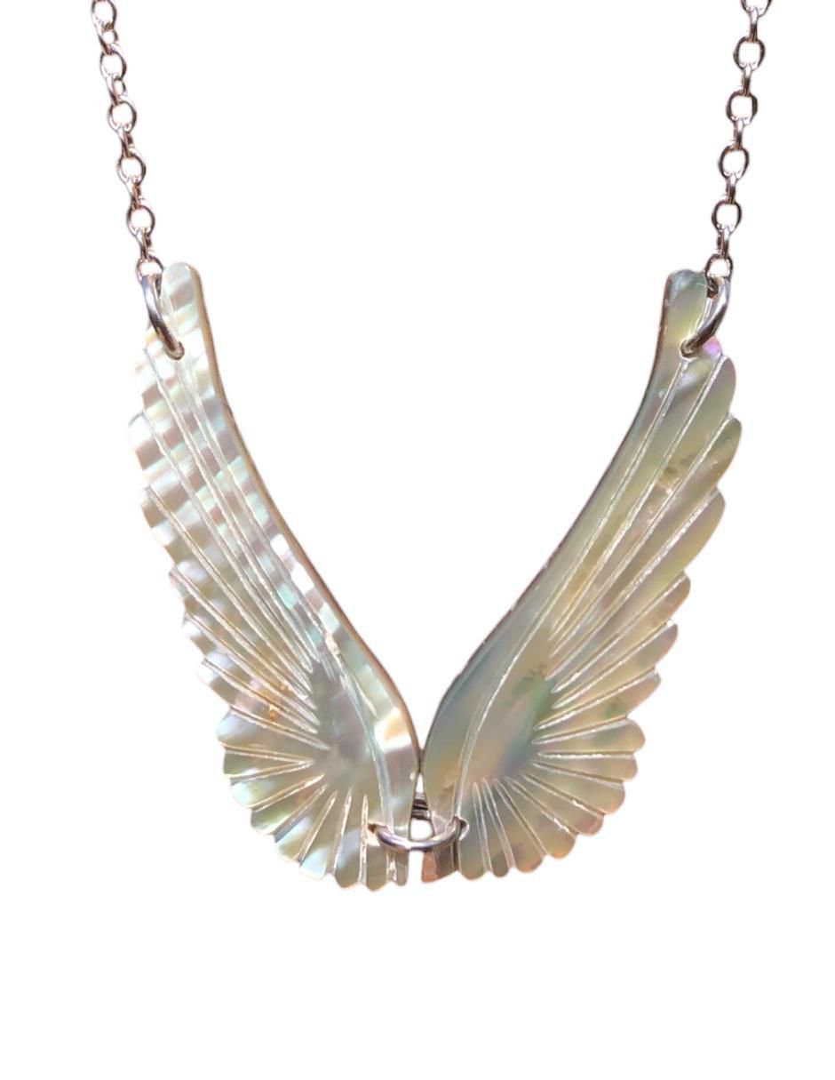 Aretes y collar de ángel mirlo blanco