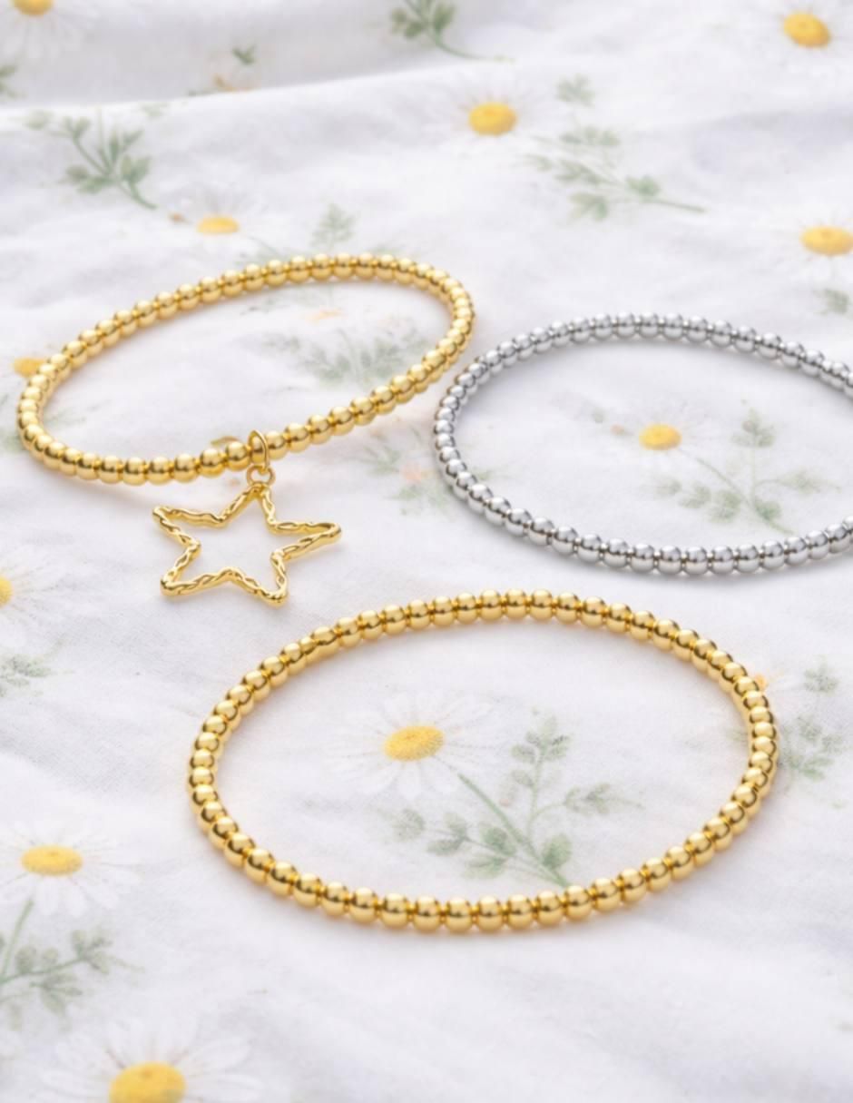 Pulsera Estelar acabado baño de oro 18 K 8