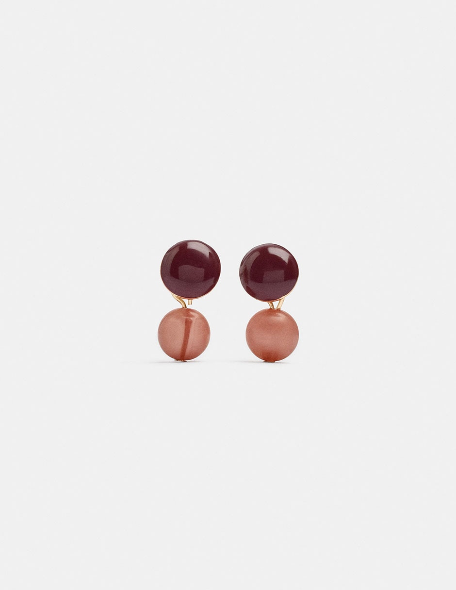Aretes largos con acabado mate Aretes largos con acabado mate