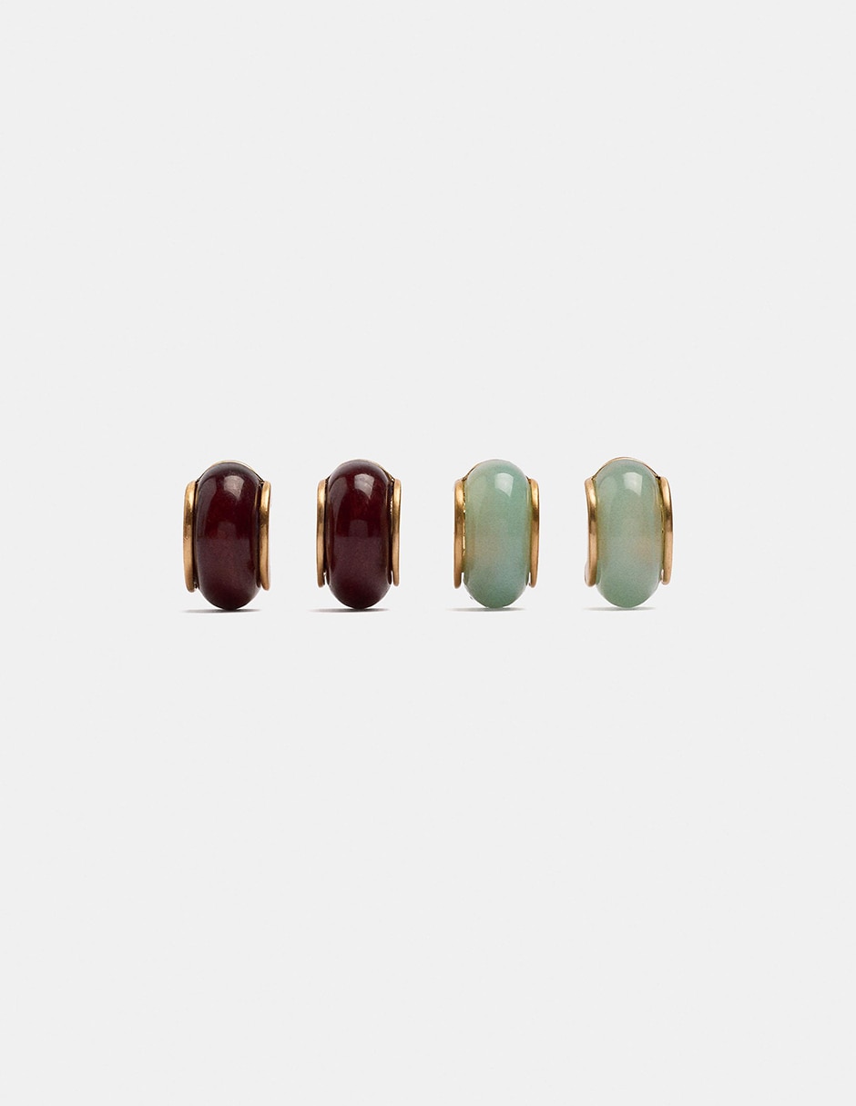 Aretes largos con acabado mate Aretes largos con acabado mate